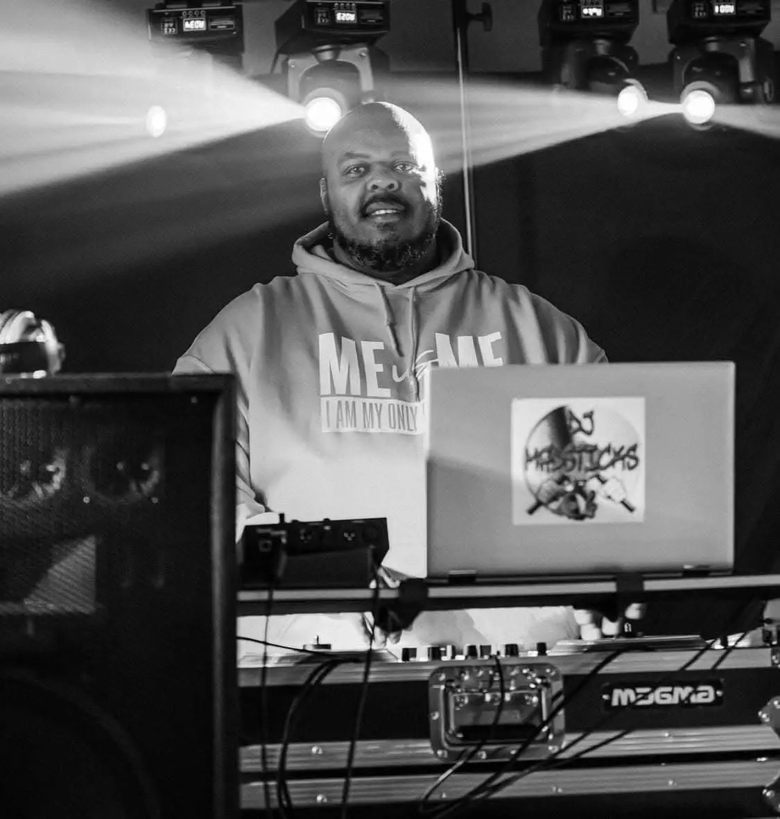 Damion Saunders performing live under stage lights