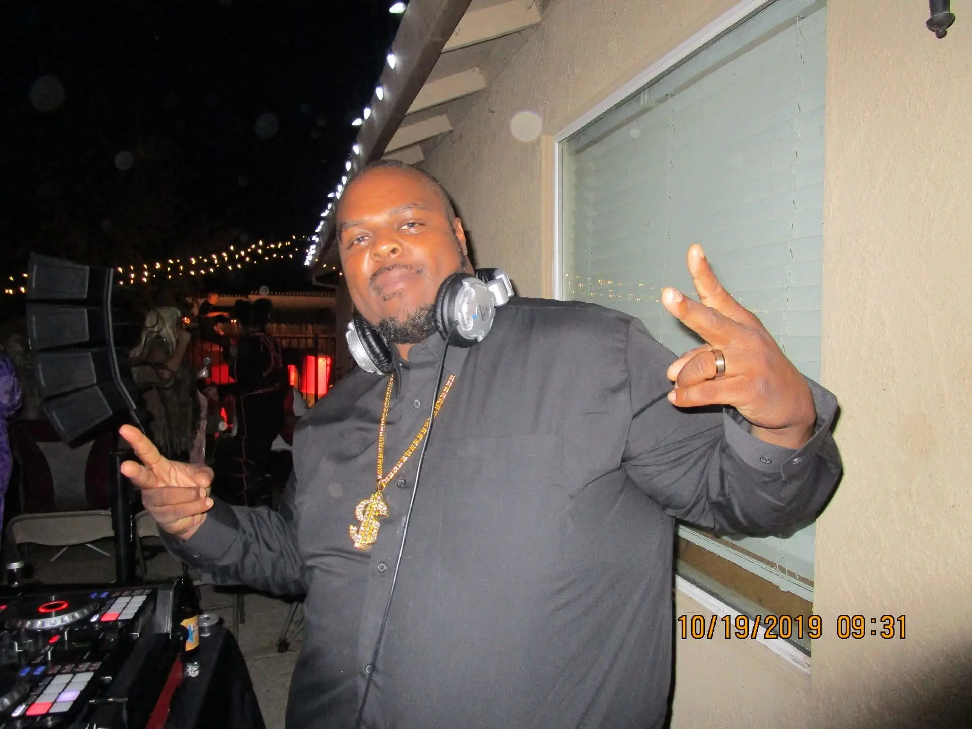 Damion Saunders DJing a private event at night